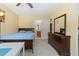 Cozy bedroom featuring a bed, dresser, and easy access to an ensuite bathroom at 163 Silver Fox Trail Trl, Dallas, GA 30157