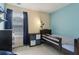Inviting bedroom with blue accent wall, bed, dresser, and natural light at 163 Silver Fox Trail Trl, Dallas, GA 30157