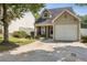 Charming home with a one car garage and landscaped yard at 163 Silver Fox Trail Trl, Dallas, GA 30157