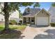 Charming home with a one car garage and landscaped yard at 163 Silver Fox Trail Trl, Dallas, GA 30157