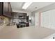 Beautiful kitchen featuring stainless steel appliances, rich wood cabinets, and laminate countertops at 163 Silver Fox Trail Trl, Dallas, GA 30157