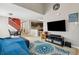 Open-concept living room showcasing a vaulted ceiling, staircase and access to the kitchen at 163 Silver Fox Trail Trl, Dallas, GA 30157