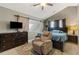 Cozy main bedroom featuring a large bed, dresser, and decorative rug, great for relaxing at 163 Silver Fox Trail Trl, Dallas, GA 30157