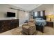 Cozy main bedroom featuring a large bed, dresser, and decorative rug, great for relaxing at 163 Silver Fox Trail Trl, Dallas, GA 30157
