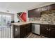 Kitchen space with updated appliances, and easy access to the patio and upstairs bedrooms at 163 Silver Fox Trl, Dallas, GA 30157