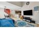 Open-concept living room featuring hardwood floors and access to the kitchen and dining area at 163 Silver Fox Trl, Dallas, GA 30157