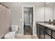 Bathroom featuring a decorative vanity and an open doorway to another room at 2980 Beards Rd, Buford, GA 30518