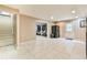 Spacious basement area showcases tile floors, staircase and easy access to the yard at 3060 Mccannon Mill Dr, Dacula, GA 30019