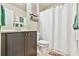 Bathroom featuring a single vanity, toilet and shower with a curtain for added privacy at 3060 Mccannon Mill Dr, Dacula, GA 30019