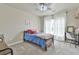 Comfortable bedroom showcases neutral wall colors, carpet and ample light from the windows at 3060 Mccannon Mill Dr, Dacula, GA 30019