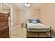 Cozy bedroom featuring neutral walls, carpeted floors, and a comfortable bed with stylish pillows at 3060 Mccannon Mill Dr, Dacula, GA 30019