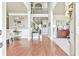 Inviting foyer with hardwood floors, staircase, and neutral decor offers a warm welcome at 3060 Mccannon Mill Dr, Dacula, GA 30019