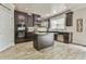 Gorgeous kitchen with stainless steel appliances, granite countertops, tile backsplash and kitchen island at 3060 Mccannon Mill Dr, Dacula, GA 30019