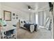 Bedroom showcases ample space, neutral colors and large mirror for a calming retreat at 3060 Mccannon Mill Dr, Dacula, GA 30019