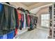 Walk-in closet complete with organized storage racks and shelves, perfect for your wardrobe at 3060 Mccannon Mill Dr, Dacula, GA 30019