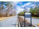 A view of the Thornwood Park community entrance sign on a sunny day at 2326 Bigwood Trl, Atlanta, GA 30349