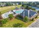 Enjoy the luxurious community pool and clubhouse from a beautiful aerial perspective at 2517 Stone Manor Dr, Buford, GA 30519