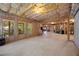 Large, unfinished basement with windows and ample space for storage or customization at 2517 Stone Manor Dr, Buford, GA 30519