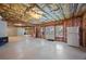 Unfinished basement featuring an insulated ceiling, utility hookups, and direct access to the backyard at 2517 Stone Manor Dr, Buford, GA 30519
