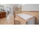 Luxurious bathroom featuring tile floors, a soaking tub, and a glass-enclosed shower at 2517 Stone Manor Dr, Buford, GA 30519