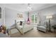 A bedroom featuring neutral paint, carpeted floors, and natural light at 2517 Stone Manor Dr, Buford, GA 30519