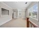 An upstairs bonus room featuring carpeted floors, natural light, and dormer windows at 2517 Stone Manor Dr, Buford, GA 30519