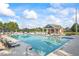 Bask in the sun at the community pool with covered seating and ample lounge chairs and picnic tables at 2517 Stone Manor Dr, Buford, GA 30519