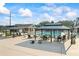 Enjoy poolside relaxation with shaded seating areas and plenty of lounge chairs in this community pool at 2517 Stone Manor Dr, Buford, GA 30519