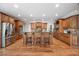 Gourmet kitchen with custom cabinets, granite countertops, stainless appliances, and center island at 2517 Stone Manor Dr, Buford, GA 30519