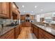 Kitchen features granite countertops, custom cabinetry, and stainless steel appliances at 2517 Stone Manor Dr, Buford, GA 30519