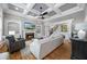 Beautiful living room with fireplace, coffered ceilings, built in bookcases and hardwood floors at 2517 Stone Manor Dr, Buford, GA 30519