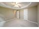 Bedroom featuring neutral walls, carpeted floors, and tray ceiling with fan at 3648 Clark Hill Way, Buford, GA 30519
