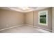 Bedroom with neutral walls, carpeted floors, a window, and a ceiling fan at 3648 Clark Hill Way, Buford, GA 30519