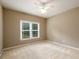 Bedroom offering neutral walls, carpet and a bright window at 3648 Clark Hill Way, Buford, GA 30519