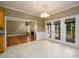 Spacious dining room flows into the living area; tiled floors and natural light at 3648 Clark Hill Way, Buford, GA 30519