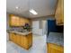 Spacious kitchen with center island, granite countertops and stainless steel appliances at 3648 Clark Hill Way, Buford, GA 30519