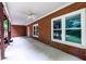 Covered patio with brick columns, ceiling fan, and stairs to yard at 3648 Clark Hill Way, Buford, GA 30519