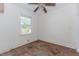 Well-lit bedroom with hardwood floors and a window showcasing the outdoors at 1167 Sanders Dr, Morrow, GA 30260