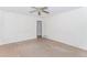 Empty bedroom with hardwood floors, white walls, and a ceiling fan at 1167 Sanders Dr, Morrow, GA 30260