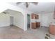 Open-concept kitchen featuring wood cabinets and a seamless transition to the living area at 1167 Sanders Dr, Morrow, GA 30260