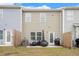 Backyard featuring a fenced yard, patio, and lawn at 11689 Mendenhall Ct, Hampton, GA 30228