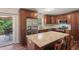 Updated kitchen with stainless steel appliances, granite countertops, and access to the back deck at 124 Hunters Mill Rd, Woodstock, GA 30188