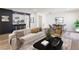 Open-concept living room with modern decor and hardwood flooring at 1783 Big Valley Ln, Stone Mountain, GA 30083