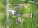 Aerial view of the house showing landscaping, and surrounding greenery at 2822 Waters Sw Rd, Atlanta, GA 30354