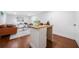 Finished basement with a sink, wood countertops, and hardwood floors at 2822 Waters Sw Rd, Atlanta, GA 30354
