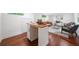 Finished basement with a sink, wood countertops, and hardwood floors at 2822 Waters Sw Rd, Atlanta, GA 30354