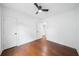Bedroom featuring hardwood floors, closet, and natural light at 2822 Waters Sw Rd, Atlanta, GA 30354