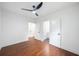 Bright bedroom features hardwood floors and white walls, enhancing spaciousness at 2822 Waters Sw Rd, Atlanta, GA 30354