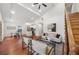 Bright living room featuring hardwood floors, a vaulted ceiling, and modern decor at 2822 Waters Sw Rd, Atlanta, GA 30354