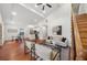 Bright, open living room featuring vaulted ceilings, hardwood floors, and a seamless flow into the kitchen and dining area at 2822 Waters Sw Rd, Atlanta, GA 30354